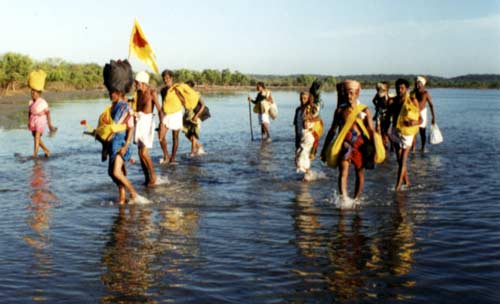Kataragama Pada Yatra pilgrims crossing Sambaltivu Lagoon on 5 June 2002