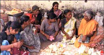 Women villagers of Kuchchaveli prepare annadanam to offer to Pada Yatra